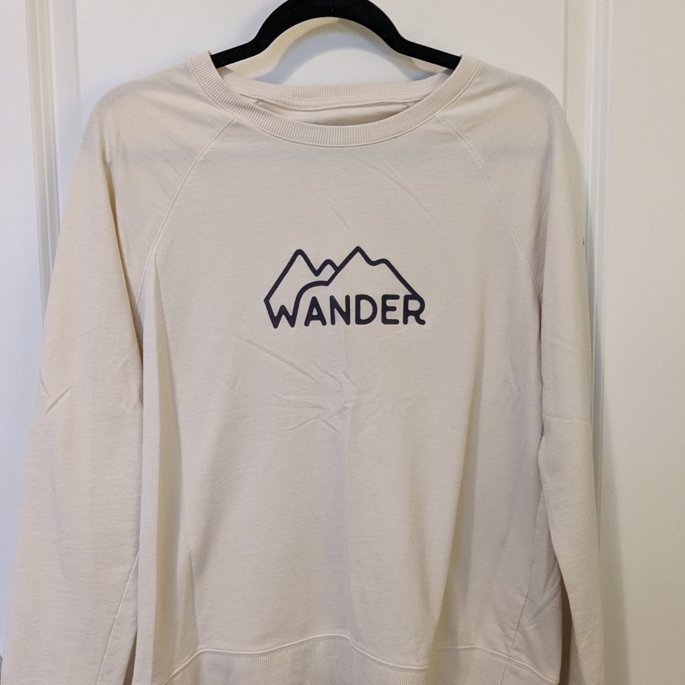 Cream colored sweatshirt